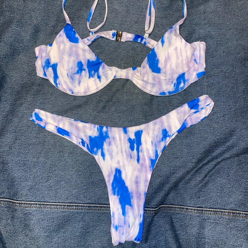 Tie dye swim suit size medium but fits like small